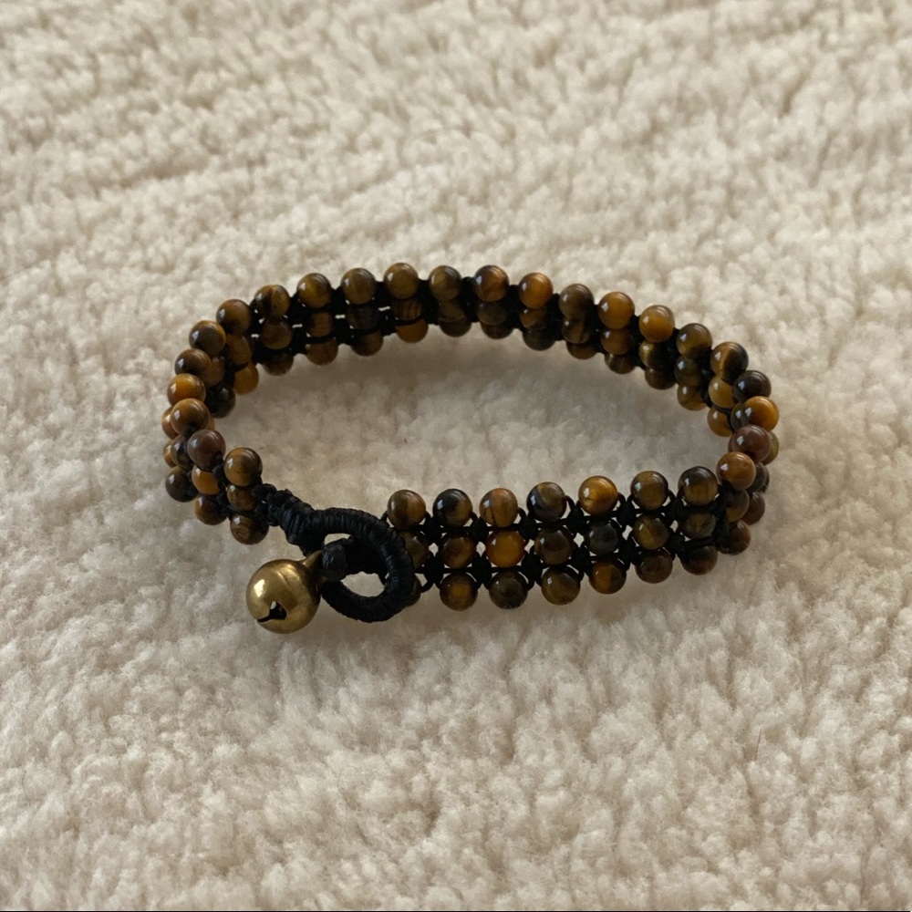 Tiger’s-eye bell woven bracelet